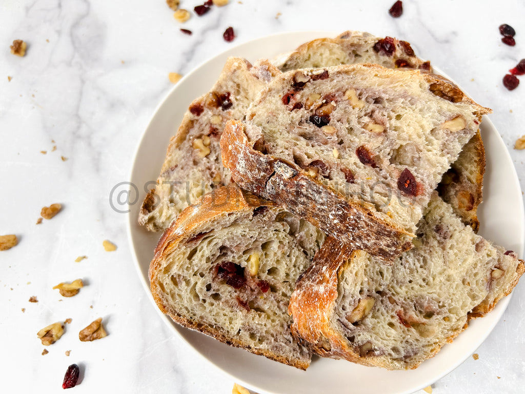 Semi-Exclusive Orange Cranberry Walnut Sourdough on Marble